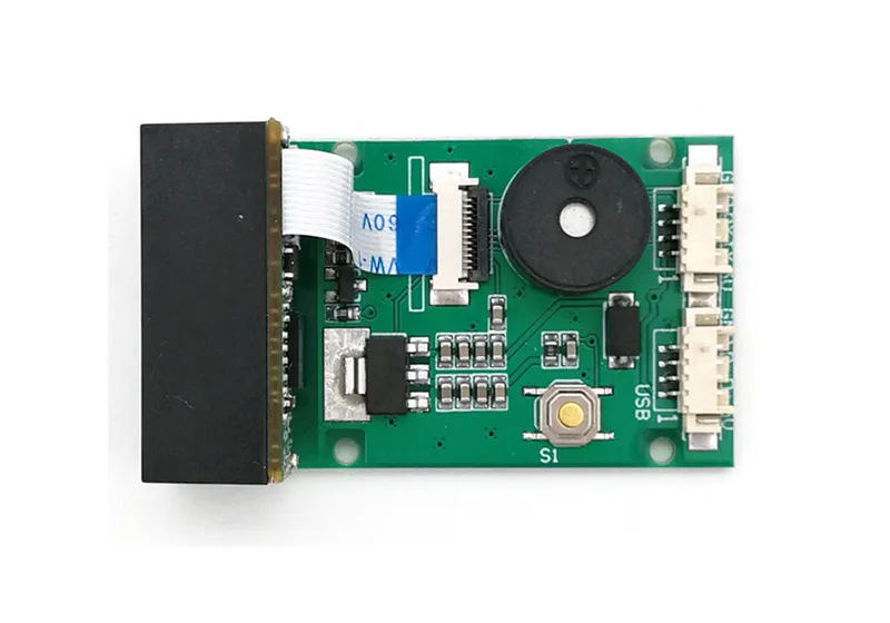 GM67 modül kartının üstten görünümü: UART ve USB konnektörleri, buzzer ve S1 butonu